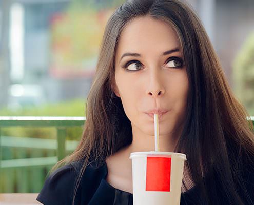 girl drinking soda